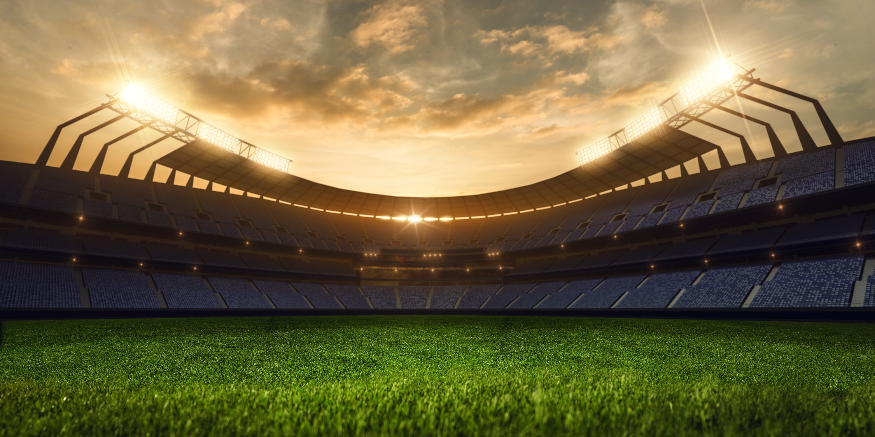 A stadium awaits competition under the setting sun